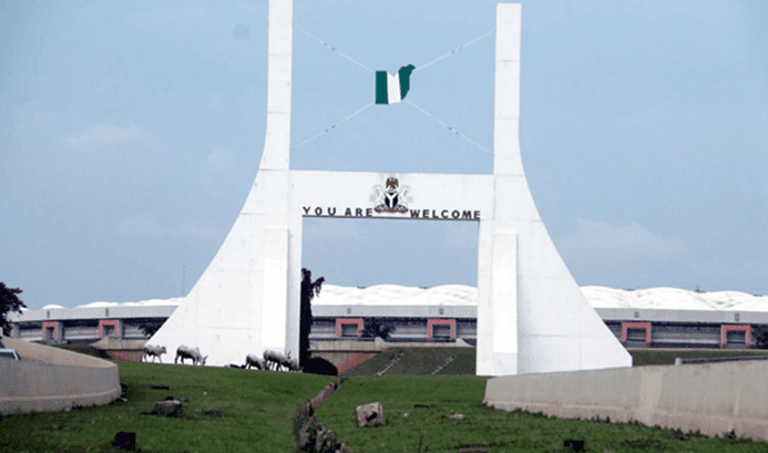 Abuja City Gate with the national stadium in the background